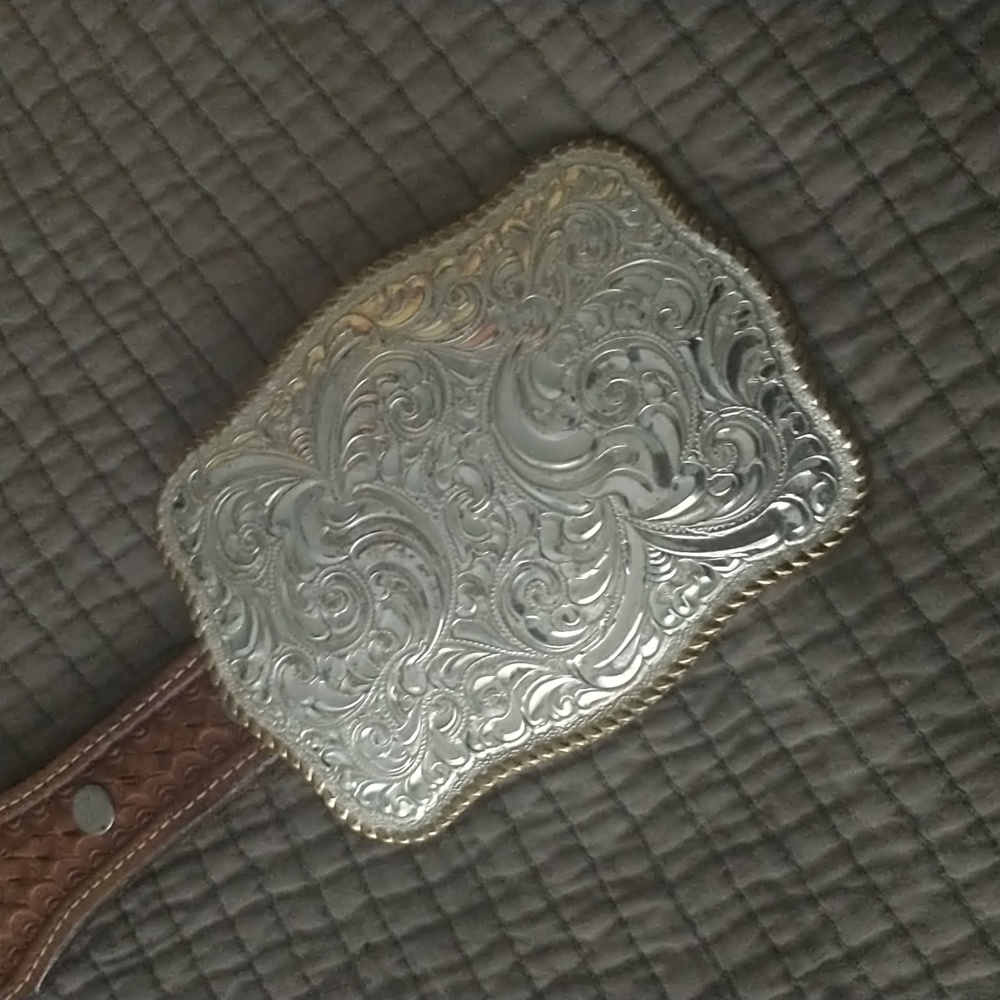 Beautiful leather belt with Silver plated buckle.